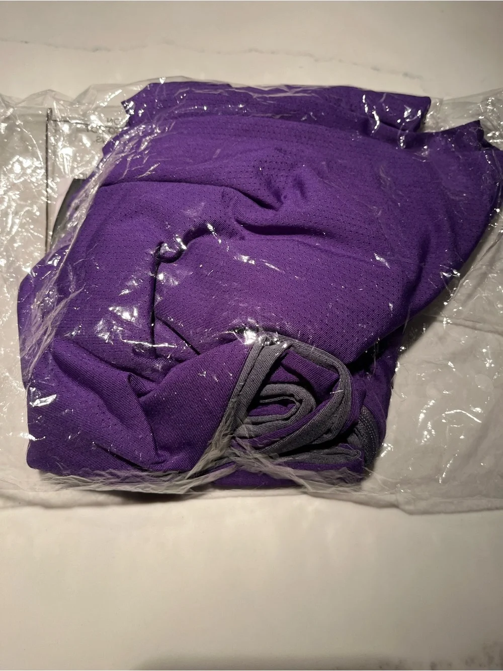 Nwt purple sholdit convertible infinity scarf with 10” long zippered pocket.